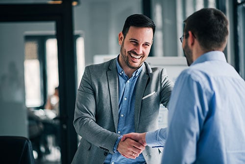 Professional Handshake in Modern Office